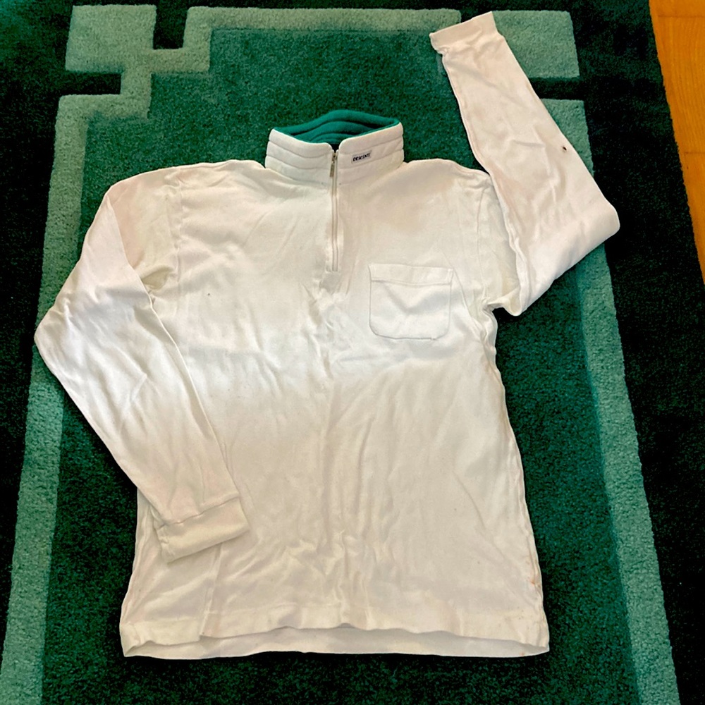Descente White 100% Fine Cotton Jersey, made in Japan.  Polyester zip up collar.